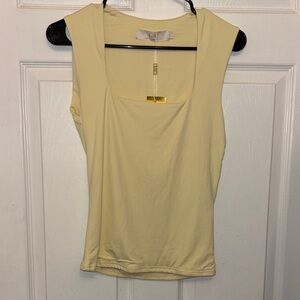 Chic Cream Sleeveless Blouse